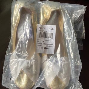 Girls gold flats from Childrens Place.  Size 6 (big girl).  New in package